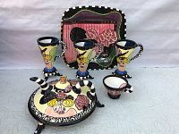 Full view of entire pottery set showing all six pieces arranged against neutral background.