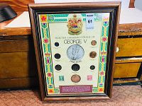 Overall view of framed collection on wooden surface