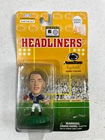 Front view packaged Kerry Collins figurine