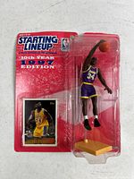 Front view of sealed Shaquille O’Neal Starting Lineup figure with trading card on red cardback