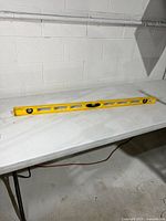 Full view of 48" yellow level on table