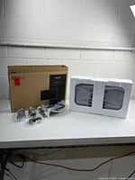 Boxed Acer SB220Q monitor with accessories and foam-packed display