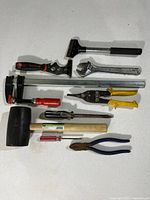 All nine hand tools laid out