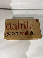 sealed Daltile box labelled glazed wall tile