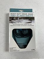 Front of packaged Evriholder heavy duty drain snake showing 2-pack and product claims