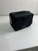 Front view of black f-stop Pro ICU insert showing overall shape and logo