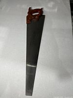 Full view of Disston 26" hand saw showing blade and handle