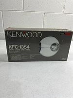 Front of boxed Kenwood KFC-1354 speaker set