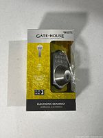 Front of sealed package showing Gatehouse electronic deadbolt