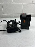 Sony TC-40 cassette recorder next to its carrying case