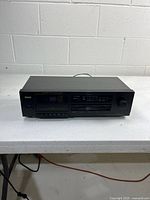 Front three-quarter view of TEAC V-285CHX cassette deck on table