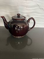 Side view of Sadler Brown Betty teapot showing overall condition, shape, glaze