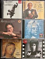 Front view of six classical music CDs in jewel cases showing cover artwork and titles
