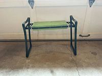 Garden kneeler bench standing open