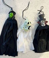 Three fabric hanging figures witch ghost skeleton