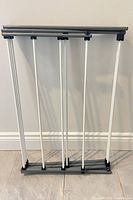 rack folded flat against wall showing full height and width