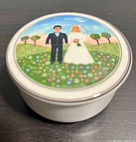 Complete trinket box with lid showing wedding couple artwork