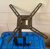 Front view of full wall mount bracket displaying VESA plate and arm