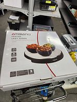 Box top showing product image and specs