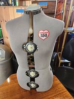 Front view showing Singer 150 logo and adjustment dials