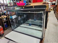 Front view of glass aquarium showing clear panels and black frame