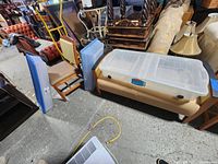 All three flat storage totes with lids visible