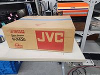 Sealed cardboard box marked JVC R-X400