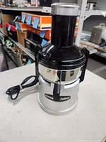 Front view of Omega juicer with power cord visible
