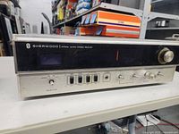 Front view of Sherwood S-7010A receiver showing controls and wear