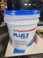 Front of USG Sheetrock Plus 3 joint compound pail showing label