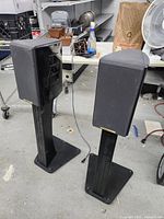 Front three-quarter view of both speakers on stands