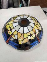 Top view of stained glass dragonfly lampshade showing overall design and aperture