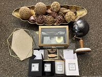 Overall lot including tray with spheres, candles, globe, glass box, geometric tray and stamp