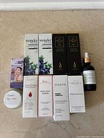 Full group shot of 11 skincare items