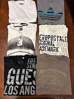 All six t-shirts laid out front view