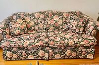 Front view of floral three-seat sofa
