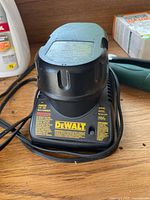 Top view of DeWalt charger showing cradle and label