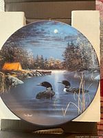 Front of plate showing loon artwork
