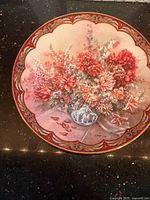 Front view of floral fairy collector plate