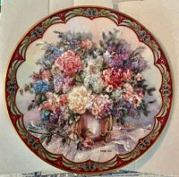 Front view of Lena Liu "Magic Makers" collector plate showing floral artwork and gold border