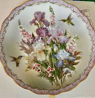 Front view of floral and hummingbird plate with gilt edge