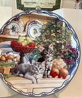 Front view of collector plate showing kitten artwork