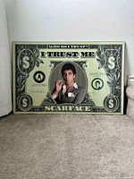 Full view of laminated Scarface print leaning against wall