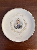 Front of plate showing portrait, laurel wreath and gilt rim