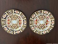 Two Royal Crown Derby Imari pattern 2451 plates, top view