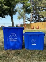 Front view of both blue recycle bins side by side