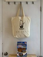 Front view of tote bag and boxed organizer