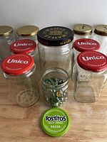 Group shot showing all jars, lids and jar of marbles