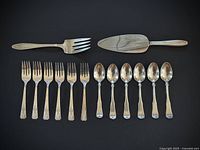 Full set layout on black background showing all 14 pieces