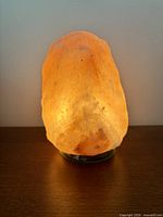 Lamp illuminated showing amber glow and crystal texture